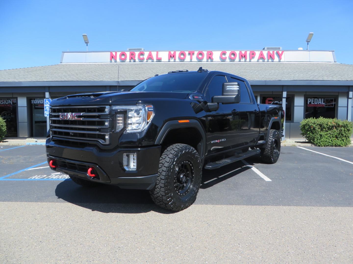 2020 BLACK /BLACK GMC Sierra 2500HD AT4 (1GT49PE76LF) with an 6.6L V8 engine, automatic transmission, located at 2630 Grass Valley Highway, Auburn, CA, 95603, (530) 508-5100, 38.937893, -121.095482 - Features a 3" BDS level kit with Fox shocks, 35" Toyo RT trail tires, 17" Method race wheels, JL audio Subwoofer, Window tint, and a power Tonneau cover. - Photo#0